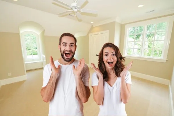 couple satisfied to the remodeled bonus room