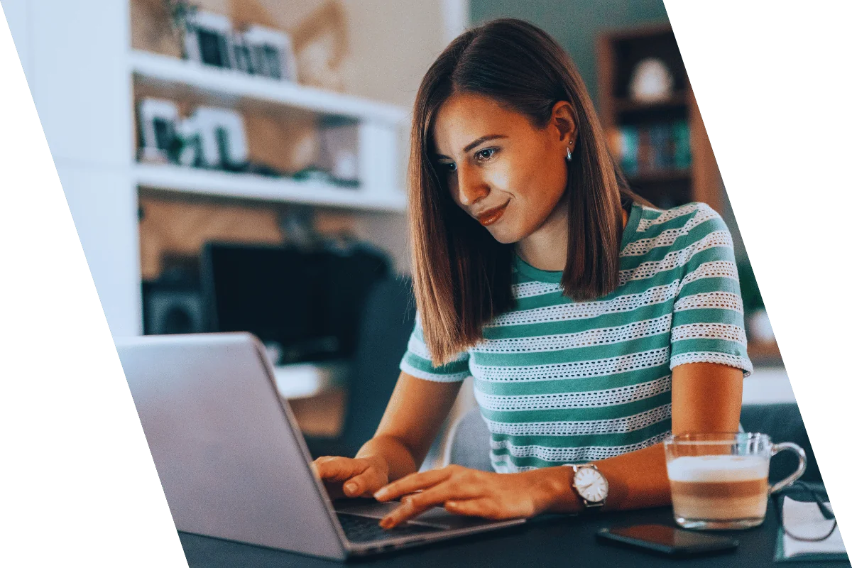 woman with coffee doing office work in office room